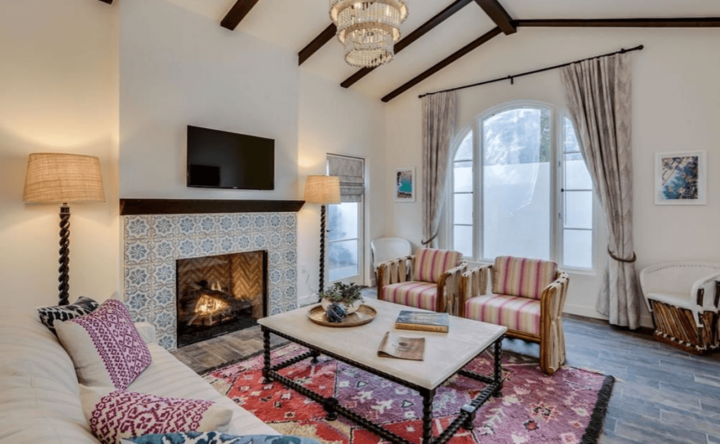 La Serena Villas in Palm Springs, boho living space with fireplace.