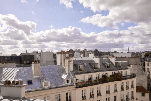 Hotel du Sentier rooftop terrace view of Paris architecture.